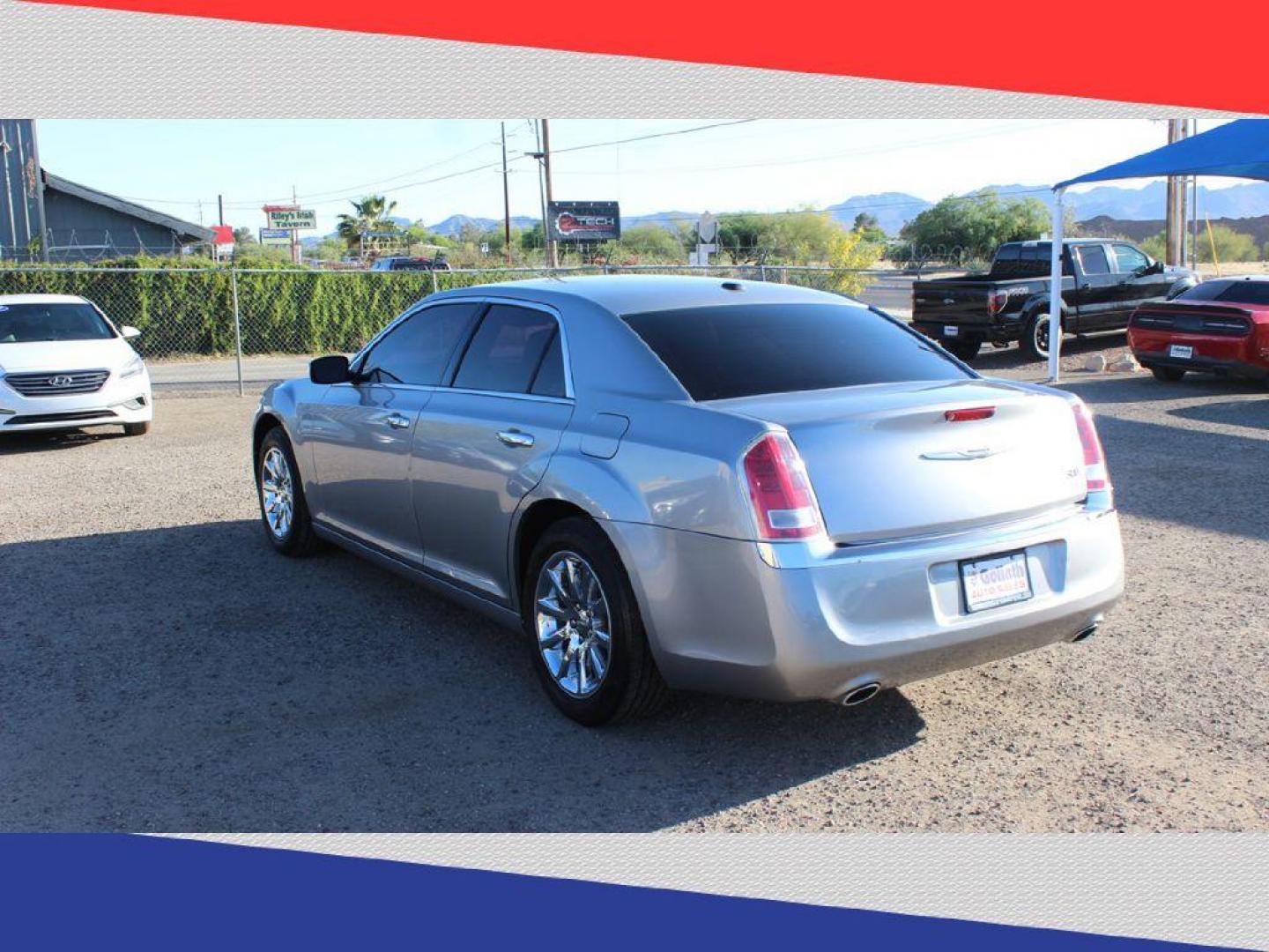 2011 Chrysler 300 Limited RWD (2C3CA5CG5BH) with an 3.6L V6 SOHC 24V engine, 5-Speed Automatic transmission, located at 5170 N La Cholla Blvd, Tucson, AZ, 85705, (520) 989-0282, 32.228245, -111.011742 - 2011 Chrysler 300 - Photo#5