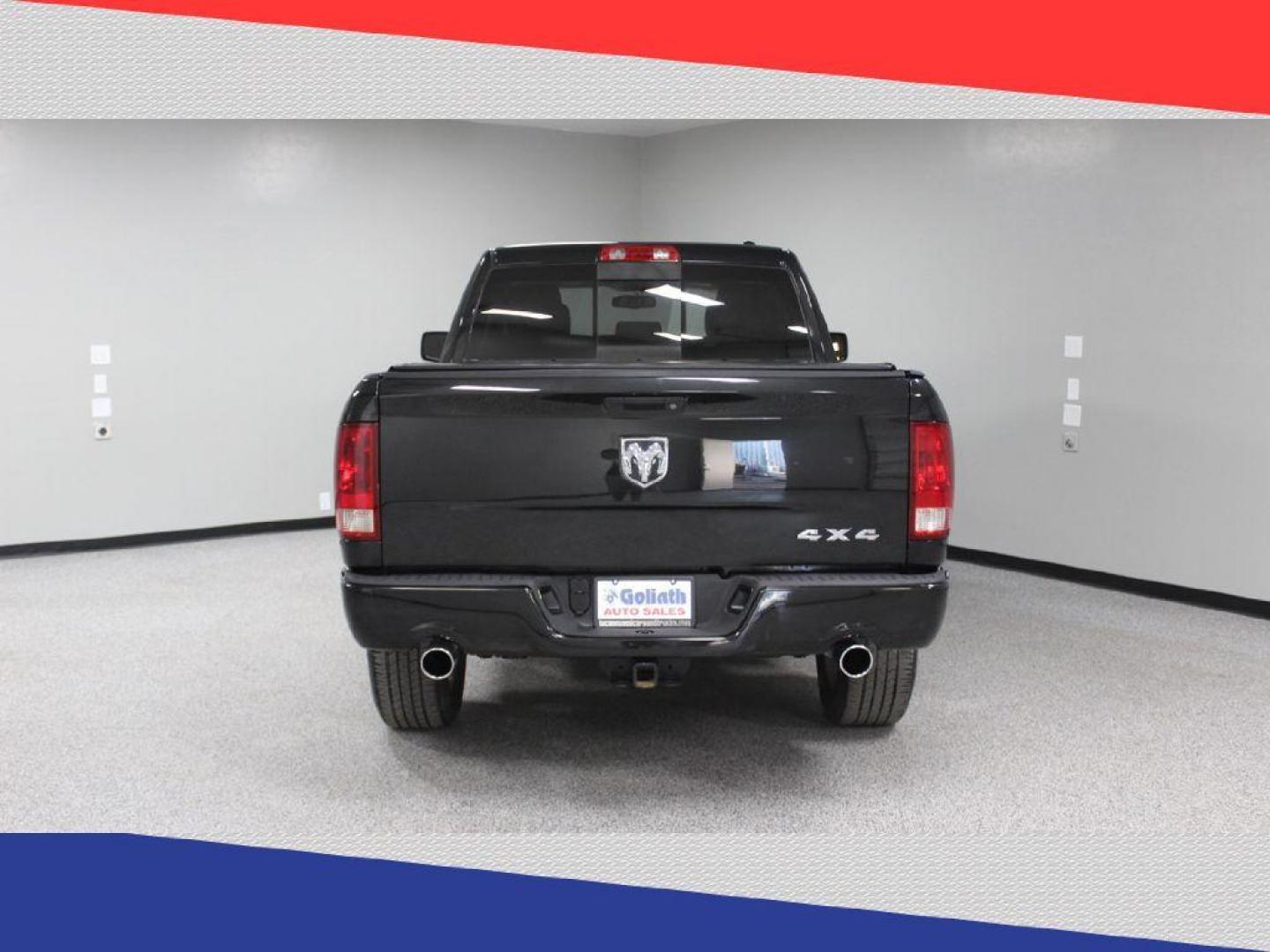 2011 Dodge Ram 1500 Sport Quad Cab 4WD (1D7RV1GT5BS) with an 5.7L V8 OHV 16V engine, 5-Speed Automatic transmission, located at 5170 N La Cholla Blvd, Tucson, AZ, 85705, (520) 989-0282, 32.228245, -111.011742 - 2011 Dodge Ram 1500 - Photo#4