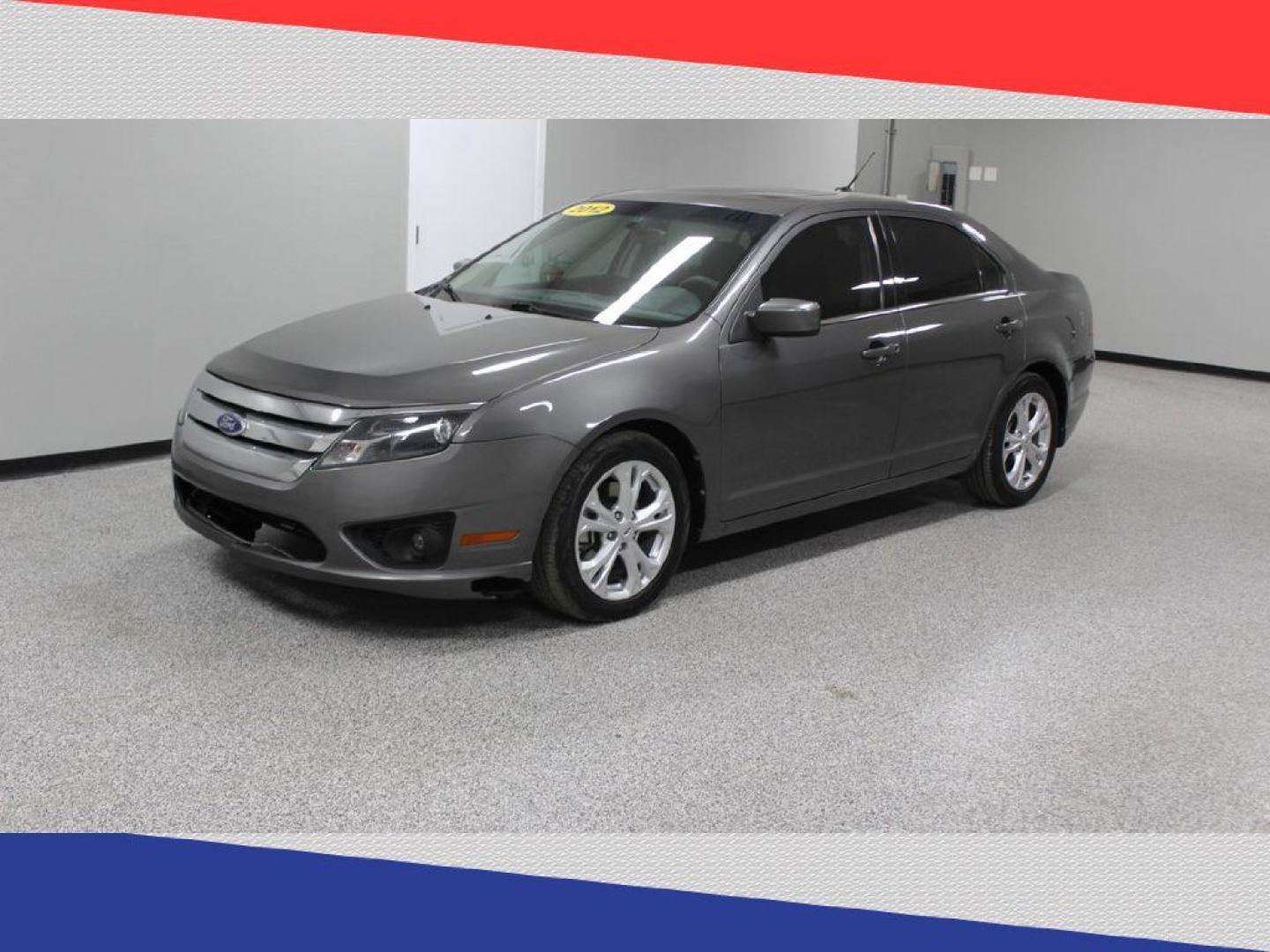 2012 Ford Fusion SE (3FAHP0HA2CR) with an 2.5L L4 DOHC 16V engine, Automatic transmission, located at 5170 N La Cholla Blvd, Tucson, AZ, 85705, (520) 989-0282, 32.228245, -111.011742 - 2012 Ford Fusion - Photo#6