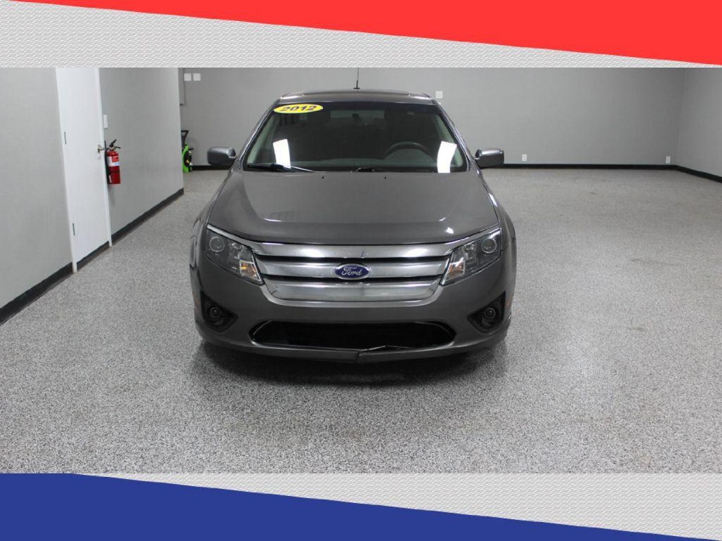 2012 Ford Fusion SE (3FAHP0HA2CR) with an 2.5L L4 DOHC 16V engine, Automatic transmission, located at 5170 N La Cholla Blvd, Tucson, AZ, 85705, (520) 989-0282, 32.228245, -111.011742 - 2012 Ford Fusion - Photo#7