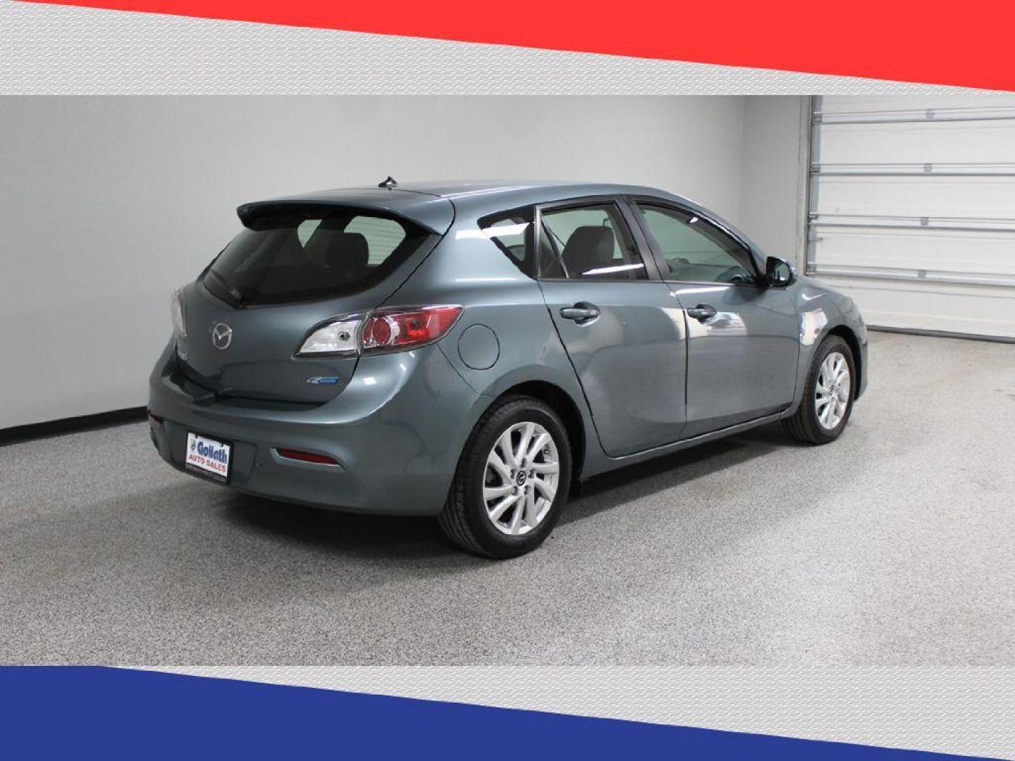 2013 Mazda MAZDA3 i Grand Touring MT 5-Door (JM1BL1MP7D1) with an 2.0L L4 DOHC 16V engine, 5-Speed Manual transmission, located at 5170 N La Cholla Blvd, Tucson, AZ, 85705, (520) 989-0282, 32.228245, -111.011742 - 2013 Mazda MAZDA3 - Photo#3