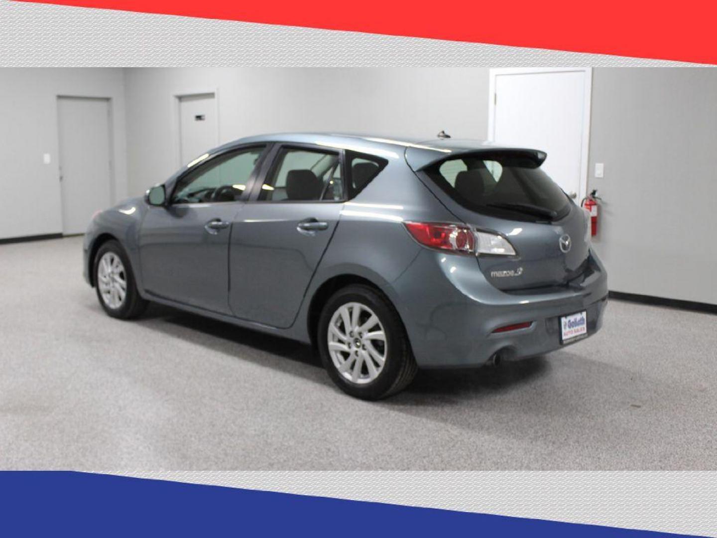 2013 Mazda MAZDA3 i Grand Touring MT 5-Door (JM1BL1MP7D1) with an 2.0L L4 DOHC 16V engine, 5-Speed Manual transmission, located at 5170 N La Cholla Blvd, Tucson, AZ, 85705, (520) 989-0282, 32.228245, -111.011742 - 2013 Mazda MAZDA3 - Photo#5